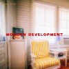 Download track Modern Development