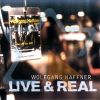 Download track The Real Thing