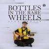 Download track Bottles In The Wheels