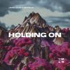 Download track Holding On (Extended Mix)