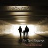 Download track En Tus Brazos (Versión Acústica)