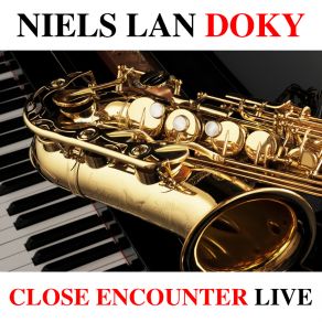 Download track December (Live) Niels Lan Doky