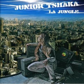 Download track Il Est Seul Et Il Marche Junior Tshaka