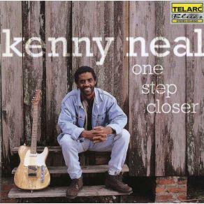 Download track Whiskey Tears Kenny Neal