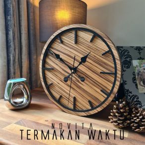 Download track Termakan Waktu Novita