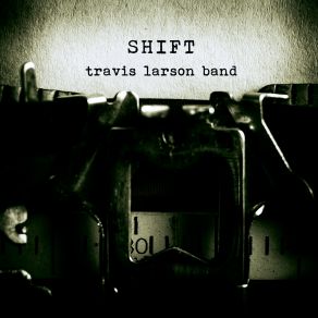 Download track The Drift Travis Larson Band