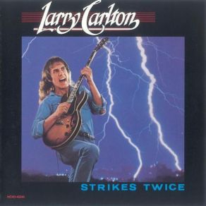 Download track Midnight Parade Larry Carlton