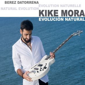 Download track Raíces Kike Mora