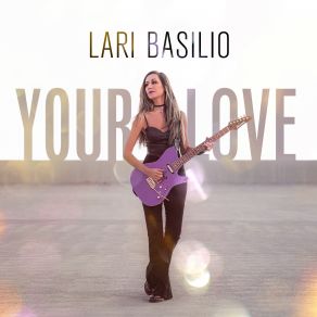 Download track Alive And Living Lari Basilio