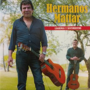 Download track Por Tu Querer No Voy A Sufrir Hermanos Mattar