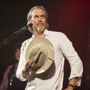 Download track Tanks Rolling Into Town Howe Gelb