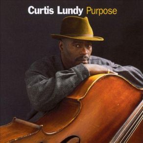 Download track Blues For J. A. Curtis Lundy