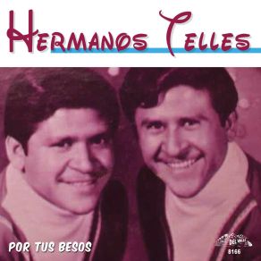 Download track A Media De La Noche Hermanos Telles