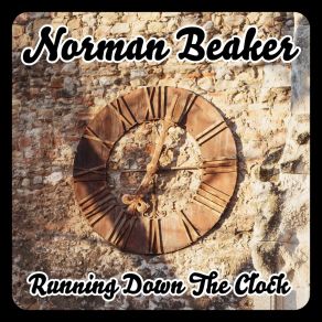 Download track She Comes With A Warning Norman Beaker