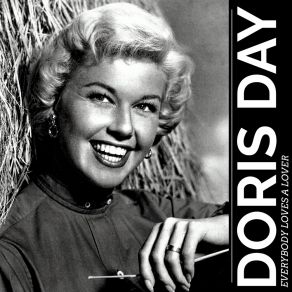 Download track The Lady's In Love With You Doris Day