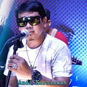 Download track Secangkir Kopi Andi Kurniawan