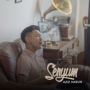 Download track Senyum Aziz Harun