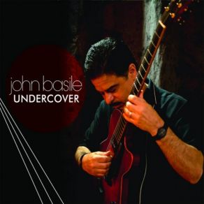 Download track You'll Never Get To Heaven John Basile