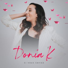 Download track T'es Qui? Donia K