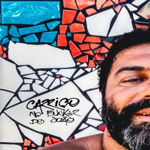 Download track Num Beijo Junior Carriço