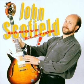 Download track Peculiar John Scofield