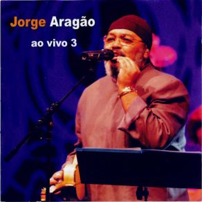 Download track Logo Agora (Live At Canecão, Rio De Janeiro RJ, Brazil / 2004) Jorge Aragão