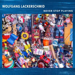 Download track At The Park Wolfgang Lackerschmid, Bänz Oester, Samuel Dühsler