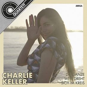 Download track Die Ganze Welt Dreht Sich Im Kreis Charlie Keller