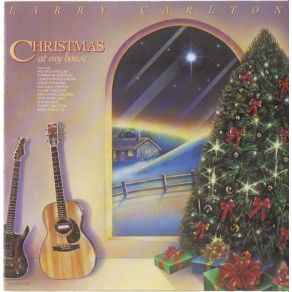 Download track The Christmas Song Larry Carlton