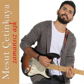 Download track Zamansz Ak Mesut Çetinkaya