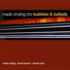 Download track Flat Blues Jacob Karlzon, Morten Lund, Mads Vinding