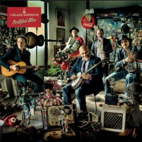 Download track Roarin Town The Black Sorrows