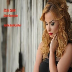 Download track Adam Sanımştım Özlem Demir