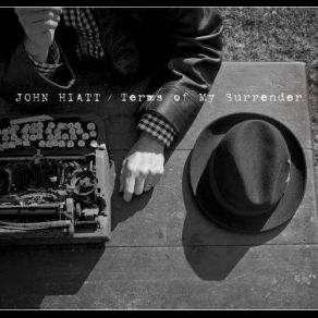 Download track Long Time Comin' John Hiatt