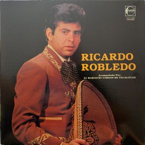 Download track Como Un Cobarde Ricardo Robledo