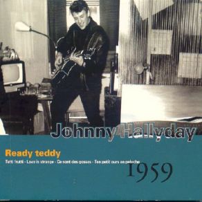 Download track LOVE IS STRANGE Johnny Hallyday