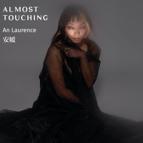 Download track Almost Touching (Asymptote) An LaurenceAsymptote