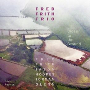 Download track In The Grip Of It Fred Frith, Glenn Jordan, Fred Frith Trio, Jason Hoopes