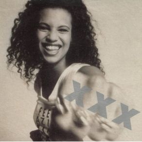 Download track Kisses In The Wind (A Little More Puerto Rican) Neneh Cherry