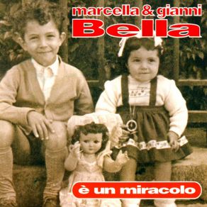 Download track E' Un Miracolo Gino Vannelli, Gianni Bella, Marcella Bella